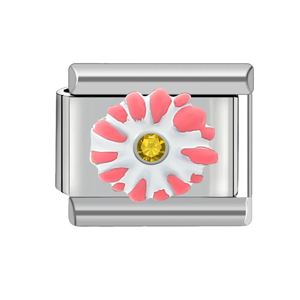 Růžovo-bílá květina s gemem