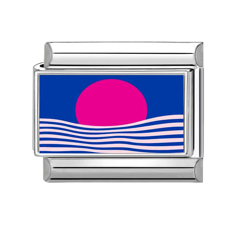 Růžový západ slunce nad vlnami