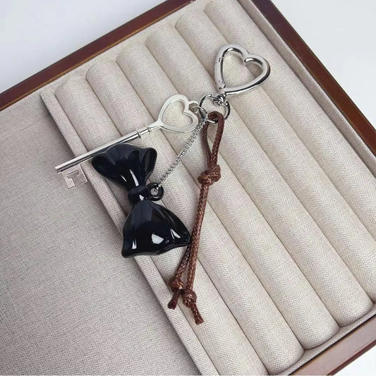 Key & Black Bow